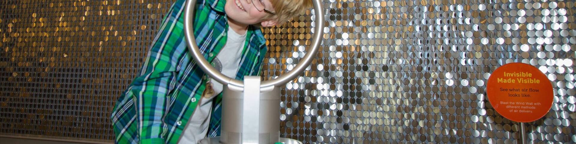 Fort Collins Museum of Discovery which includes interior views as well as an individual child