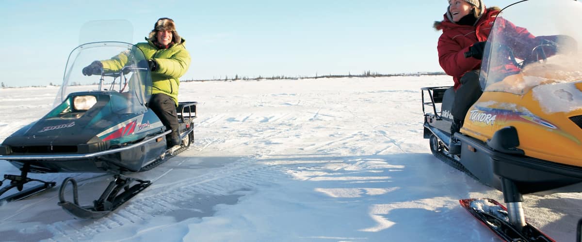 Manitoba mostrando paseo en motos de nieve y nieve