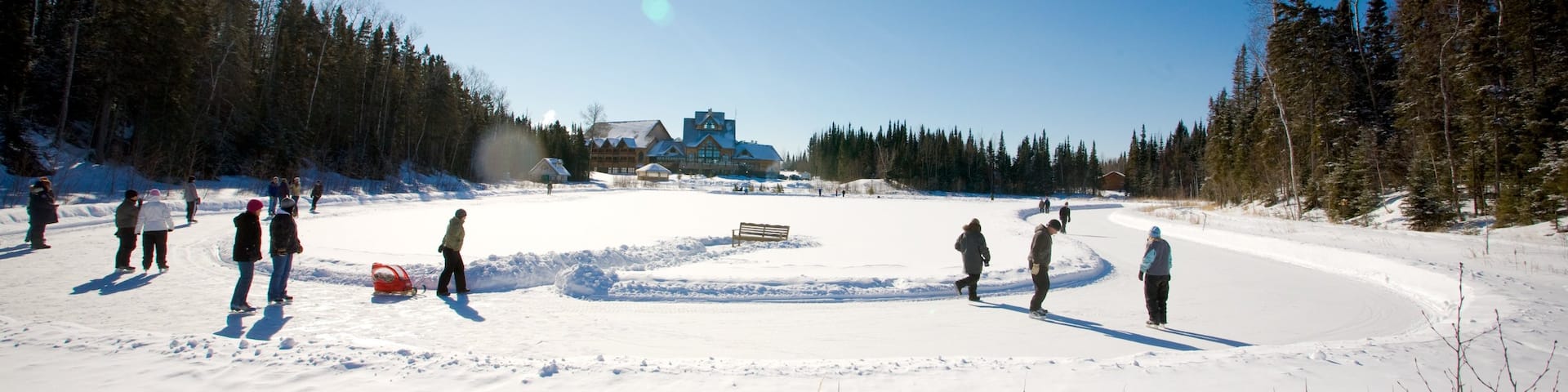 Saskatchewan showing snow and ice skating as well as a large group of people