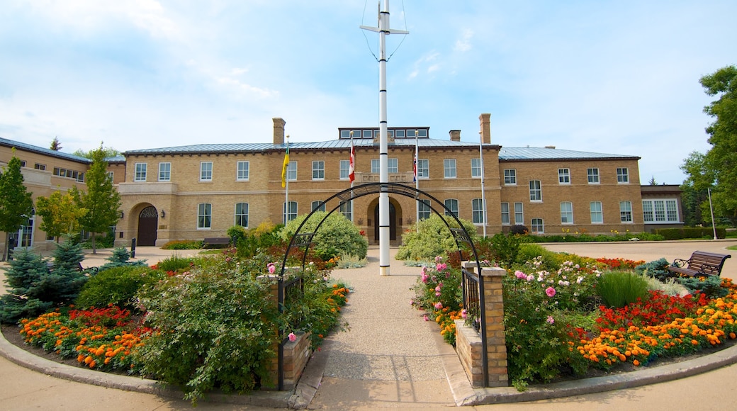 Government House featuring an administrative building, flowers and heritage architecture