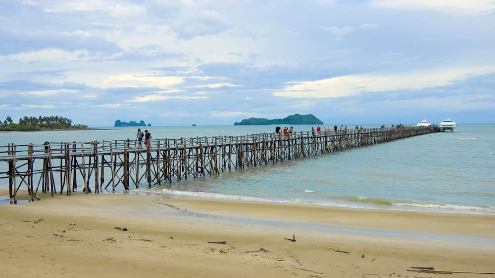 Chumphon which includes a bridge and a beach