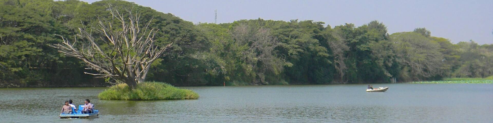 Mysore featuring boating and a lake or waterhole