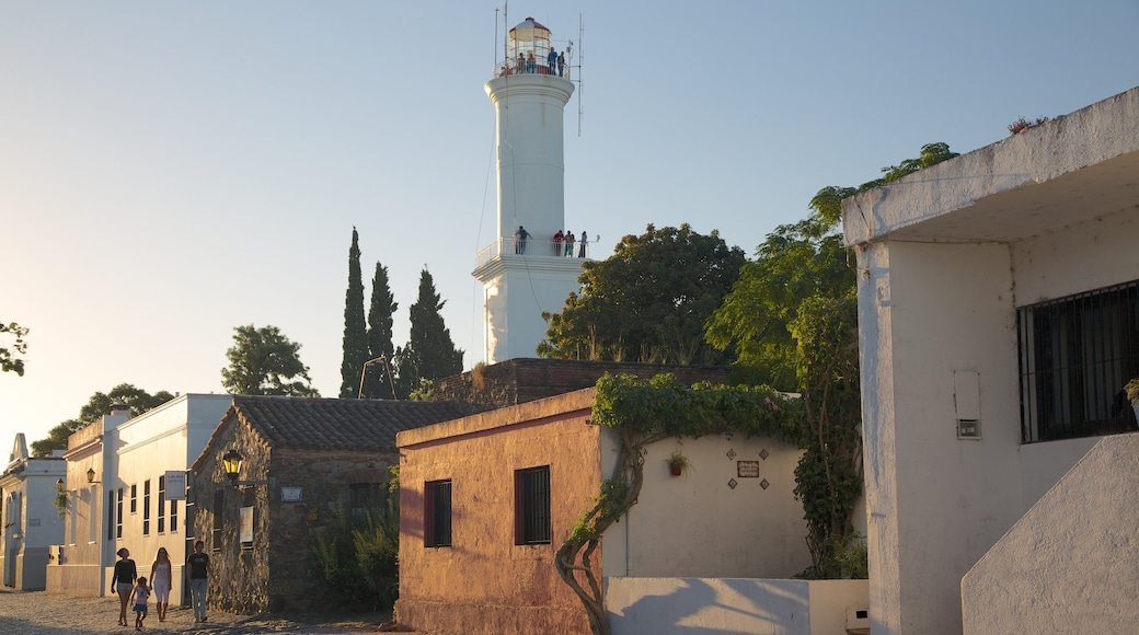 Colonia del Sacramento Lighthouse showing a sunset, a lighthouse and heritage architecture