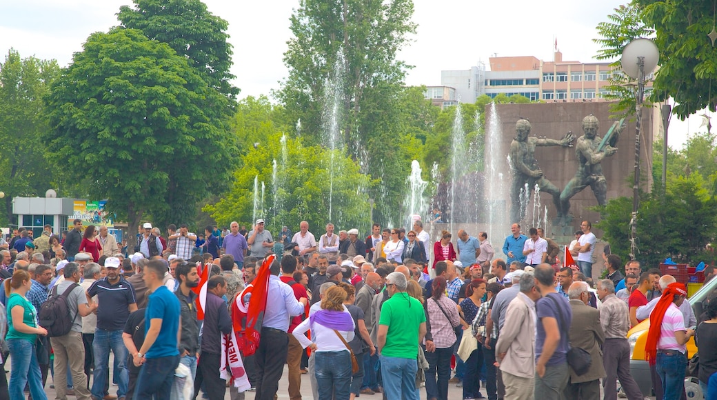 Kizilay Square showing street scenes as well as a large group of people