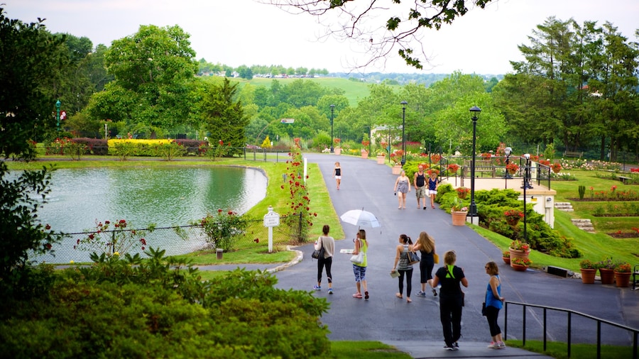 Hershey Gardens featuring a garden as well as a small group of people