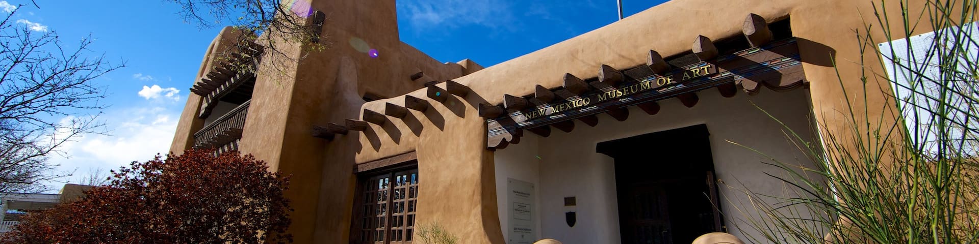 New Mexico Museum of Art featuring art and a house