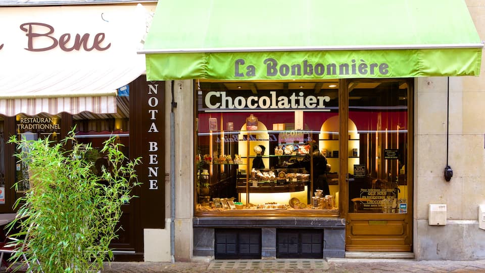 Aix-les-Bains which includes street scenes and signage