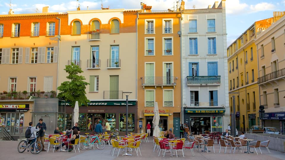 Perpignan caracterizando jantar ao ar livre, uma praça ou plaza e cenas de cafeteria