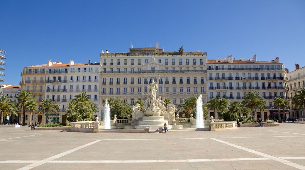 Place de la Liberte featuring a square or plaza and a fountain