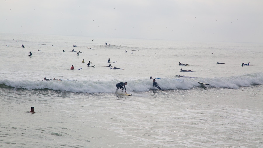 Lima which includes surfing and waves as well as a large group of people