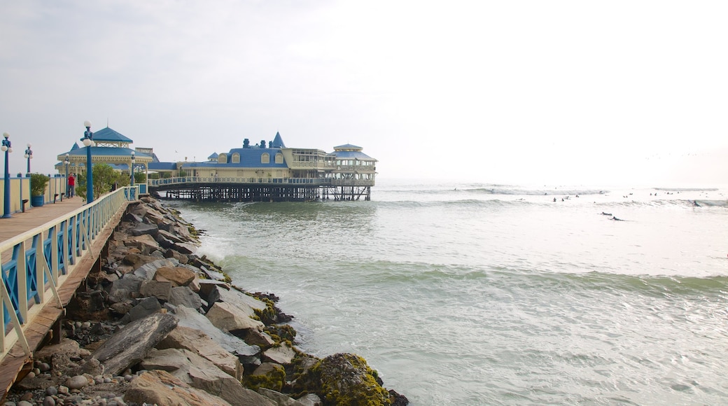 Lima which includes rocky coastline and general coastal views