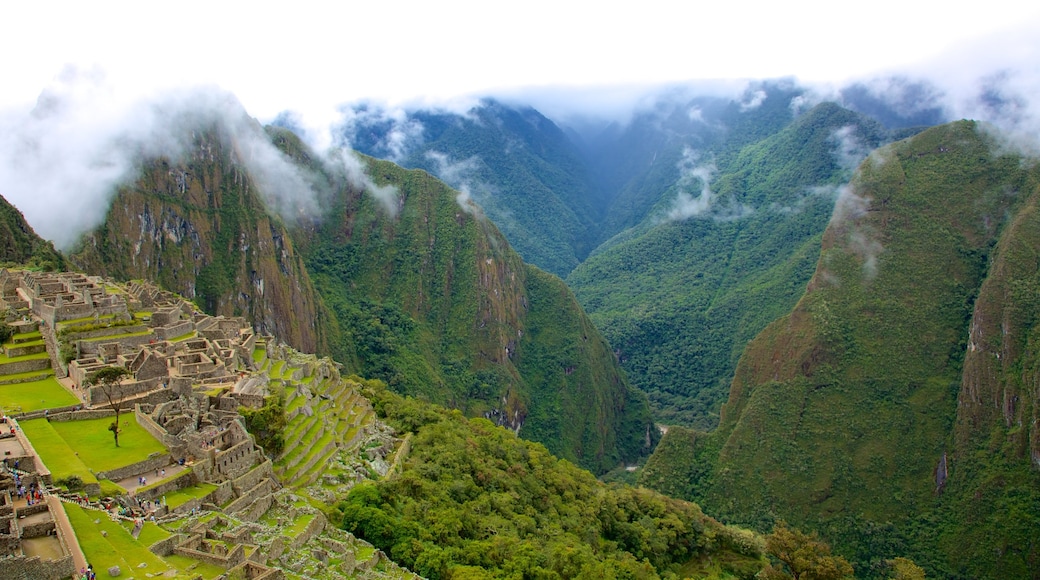 Cusco mostrando ruínas de edifício, paisagem e montanhas