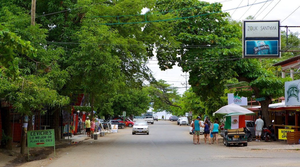 Coco Beach showing street scenes