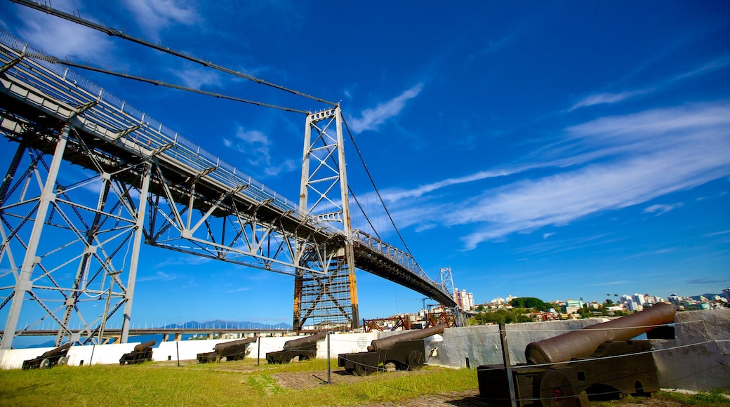 Hercilio Luz Bridge which includes a bridge and military items