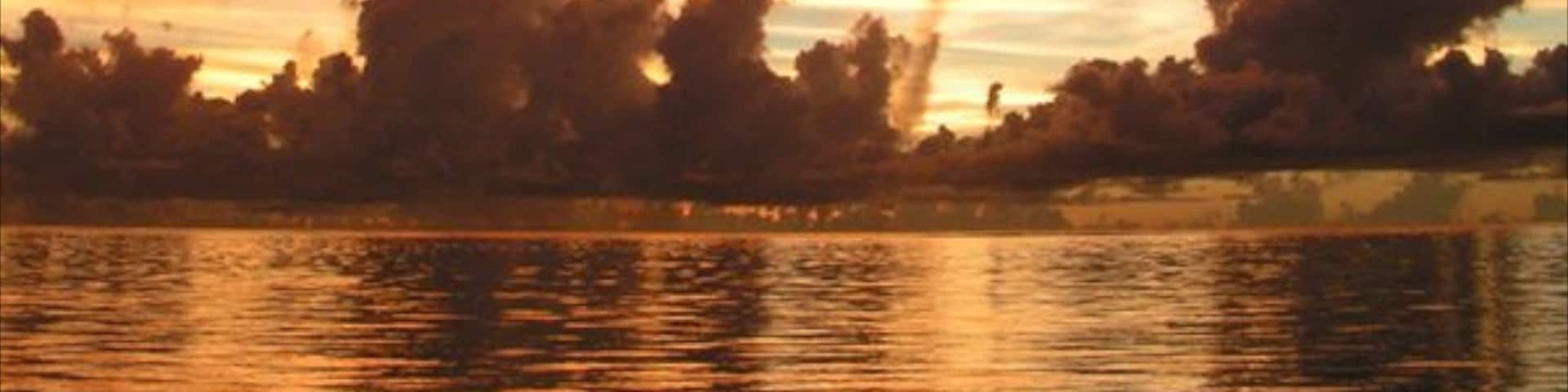 Saipan featuring general coastal views, a sunset and landscape views
