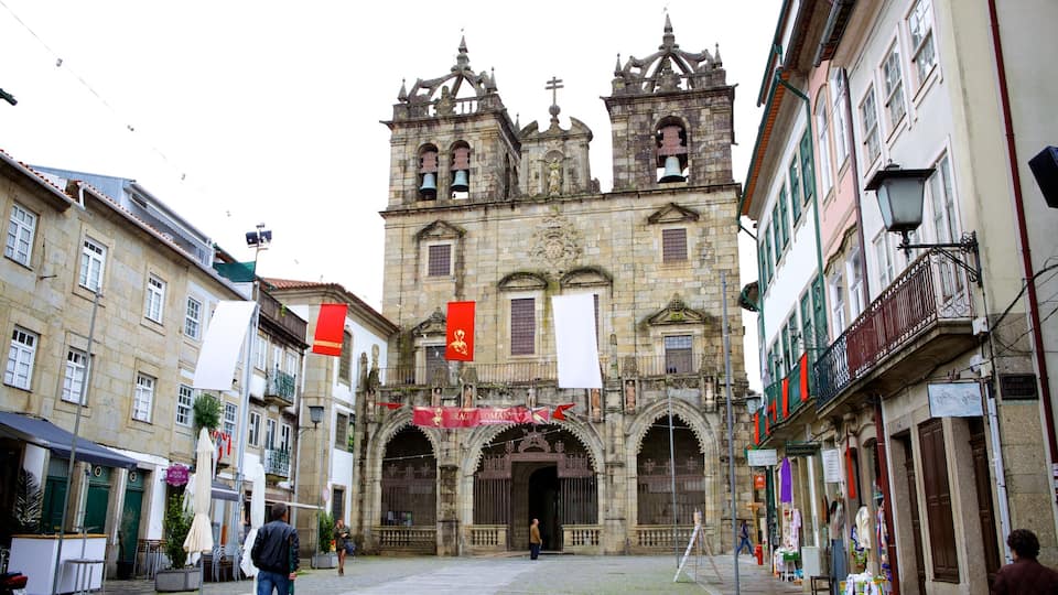 Braga Cathedral which includes a church or cathedral and street scenes