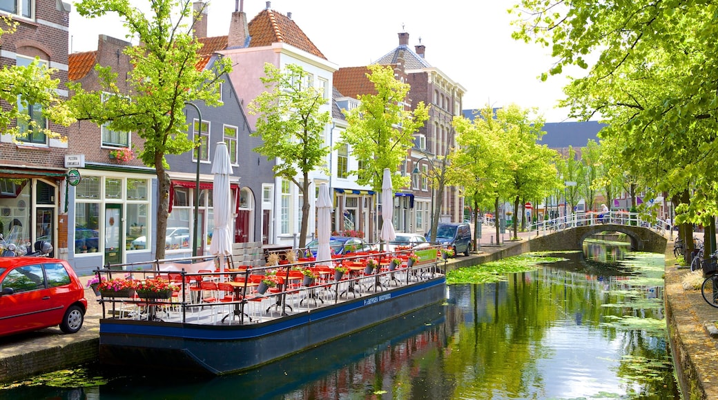 Delft ofreciendo escenas urbanas y un río o arroyo