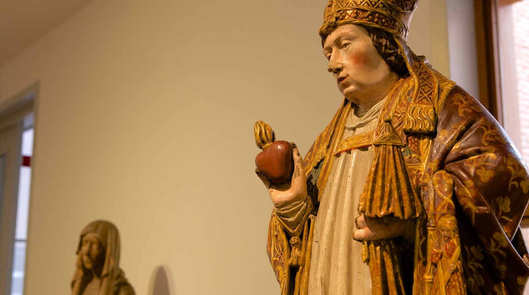 Bonnefanten Museum showing a statue or sculpture and interior views