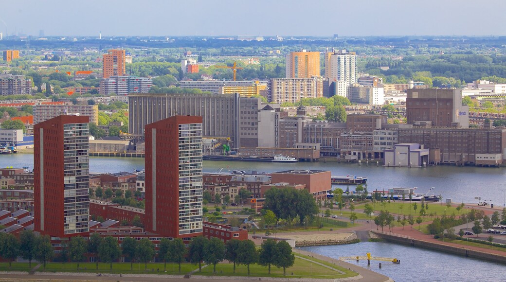 Euromast which includes a city, modern architecture and a river or creek