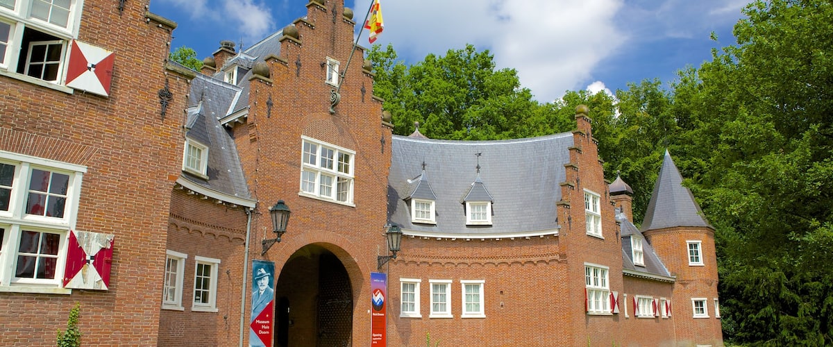 Kasteel Huis Doorn mostrando una casa y elementos del patrimonio