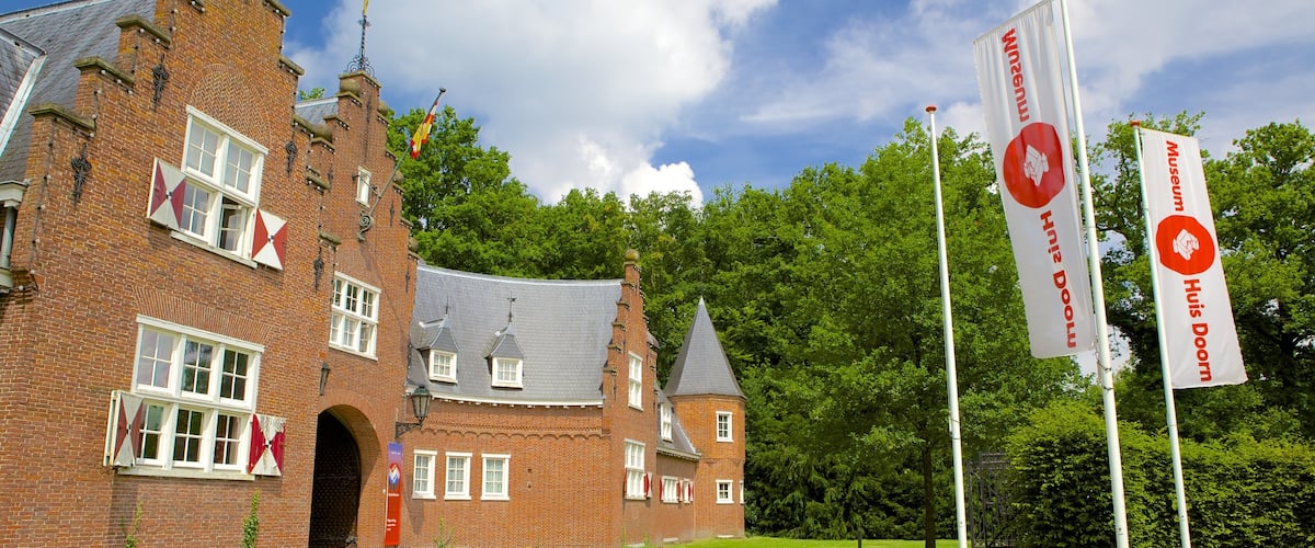 Huis Doorn mostrando uma casa e elementos de patrimônio