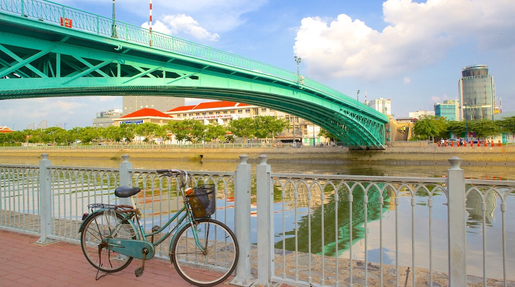 Saigon River featuring a river or creek and a bridge