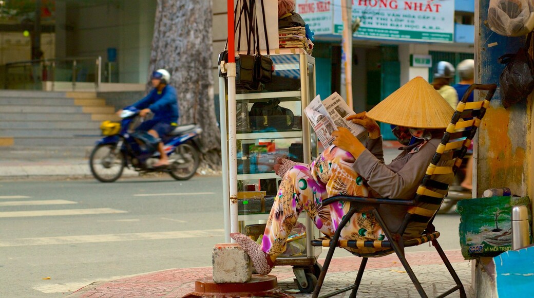 Bui Thi Xuan featuring street scenes as well as an individual female