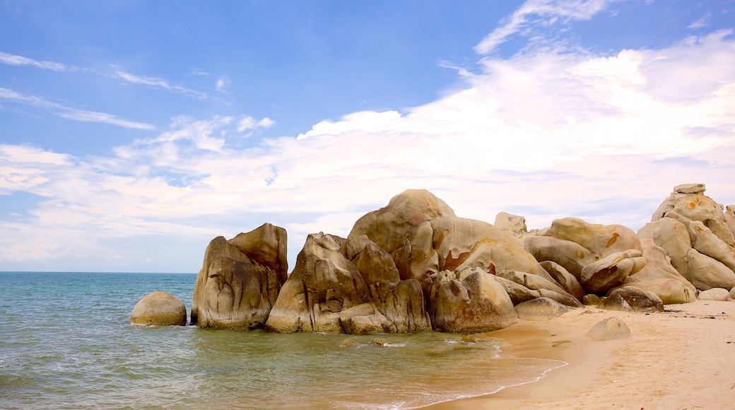 Tien Thanh Beach featuring a sandy beach and rugged coastline