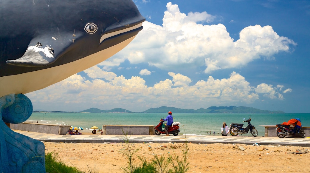 Back Beach showing a sandy beach and outdoor art