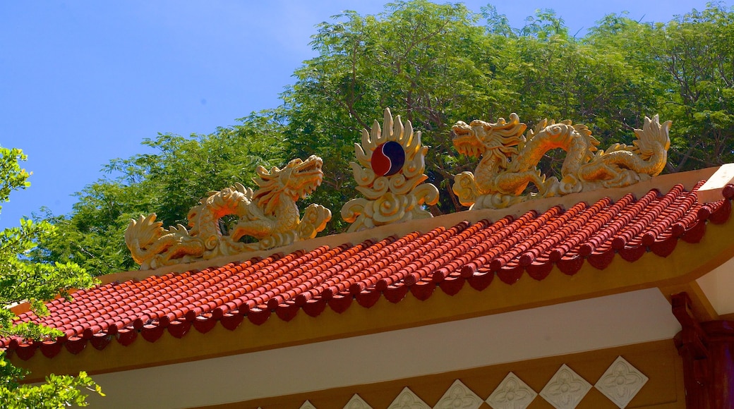 Minh Dam Mountain showing a temple or place of worship and heritage architecture