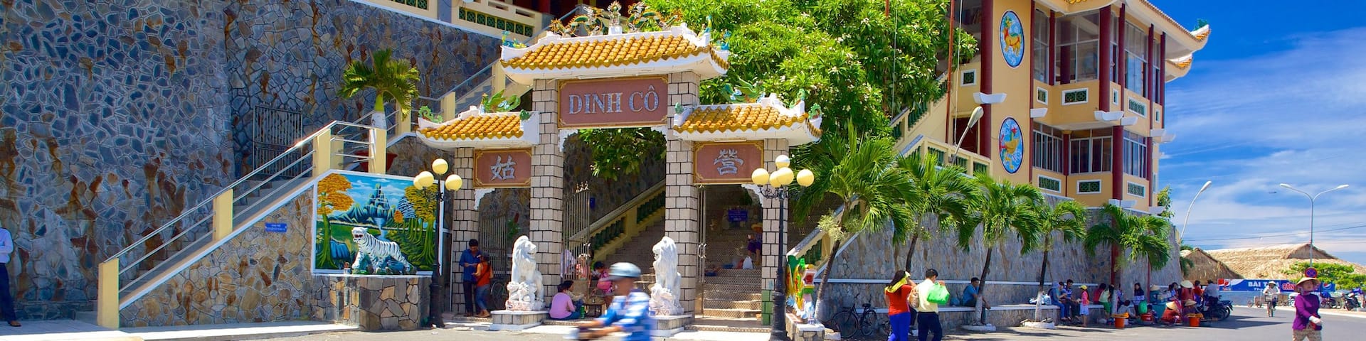 Dinh Co Temple featuring religious aspects, street scenes and a temple or place of worship