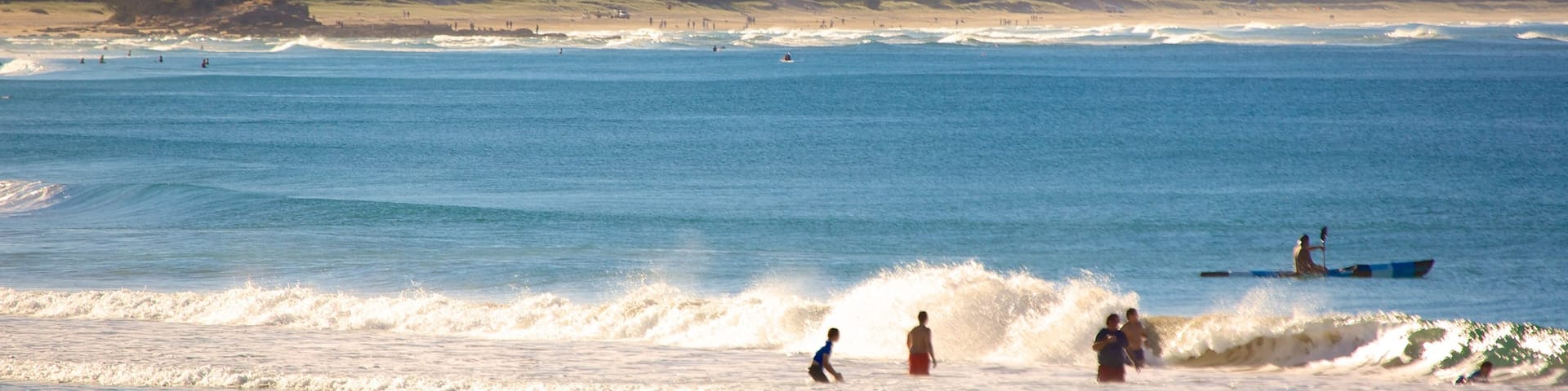 Alex Beach which includes general coastal views and mountains