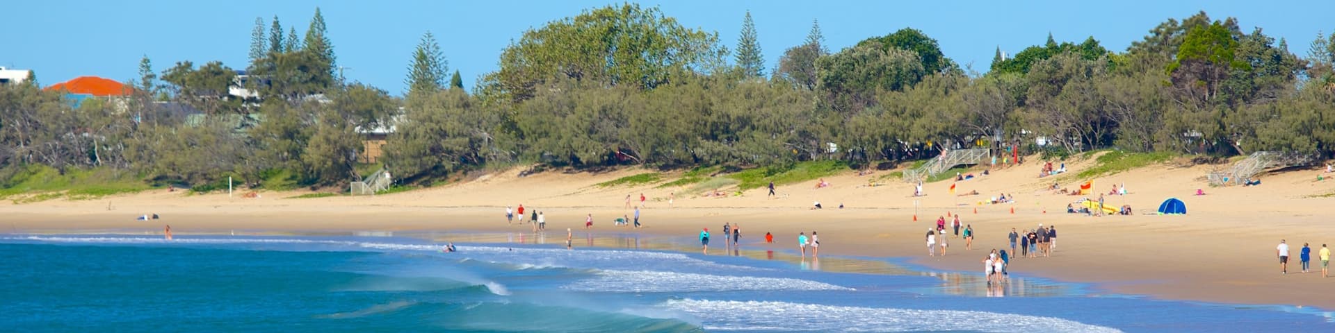Mooloolaba Beach showing a bay or harbor and a beach as well as a large group of people