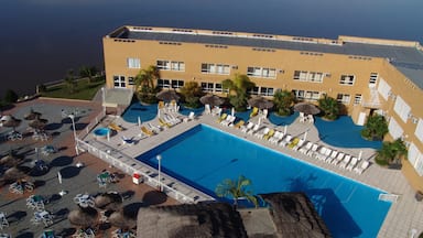 Santiago del Estero which includes a luxury hotel or resort, a pool and a hotel