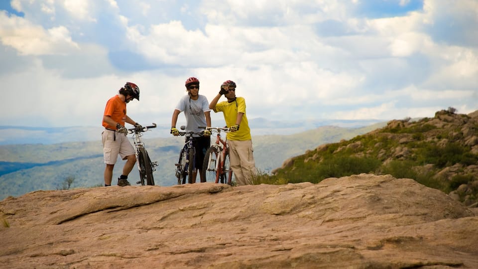 Cordoba featuring mountain biking as well as a small group of people