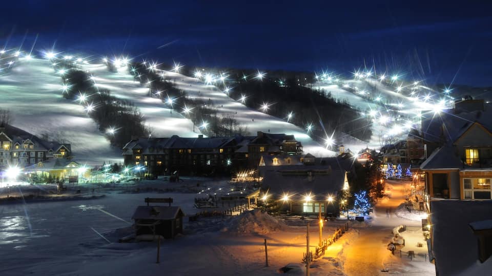 Blue Mountain Ski Resort which includes night scenes, a small town or village and a luxury hotel or resort
