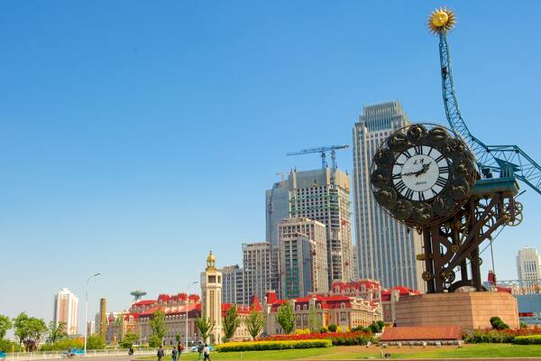 Tianjin which includes outdoor art, a square or plaza and a city