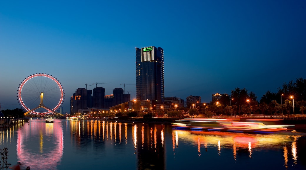 Tianjin Eye das einen bei Nacht, Stadt und Fluss oder Bach