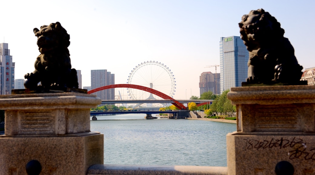 Tianjin Eye showing a river or creek, a bridge and a city