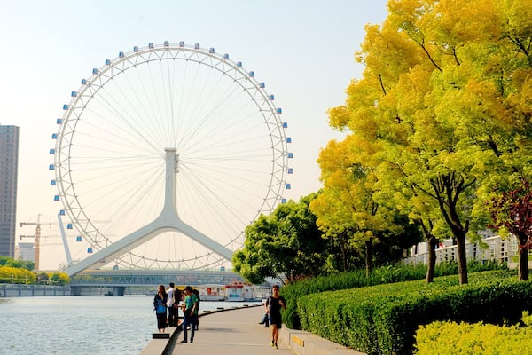 Tianjin Eye featuring street scenes, a garden and a river or creek