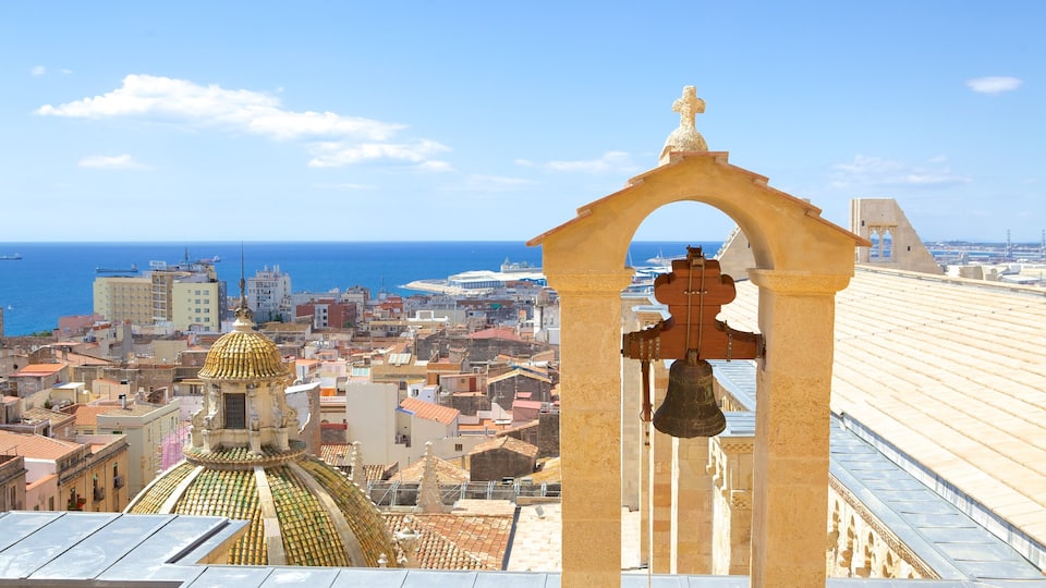 Tarragona Cathedral featuring a coastal town and a city