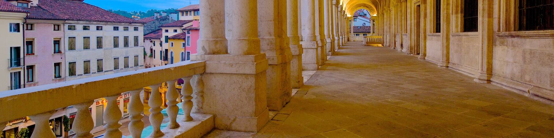 Piazza dei Signori which includes heritage architecture, night scenes and heritage elements