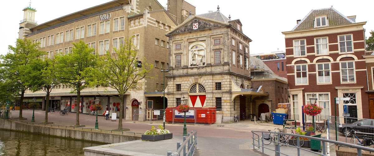 Waag which includes a bridge, heritage architecture and street scenes