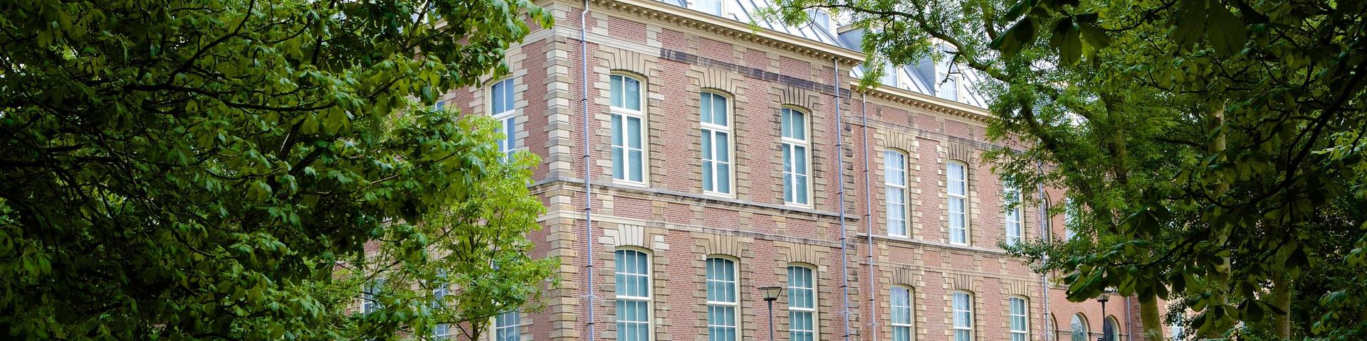 National Museum of Ethnology featuring boating and a river or creek as well as a small group of people