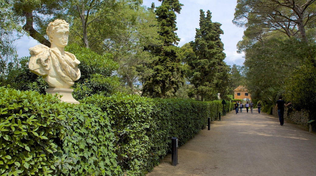 Santa Clotilde Gardens which includes a statue or sculpture, a park and outdoor art