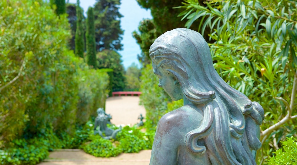 Jardines de Santa Clotilde mostrando una estatua o escultura, arte al aire libre y un jardín