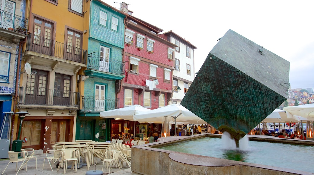 Plaza de la Ribeira mostrando una fuente, un parque o plaza y escenas de café
