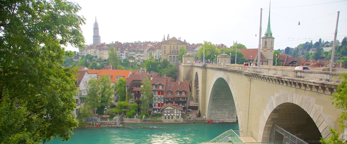 Bear Pits which includes a river or creek, a bridge and a small town or village