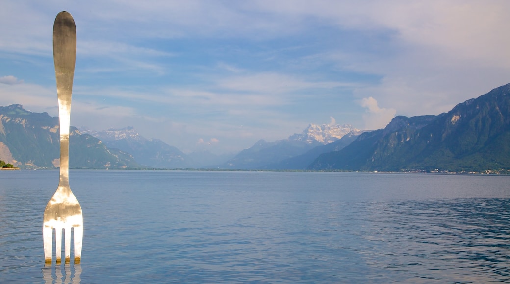 Vevey featuring a lake or waterhole and outdoor art