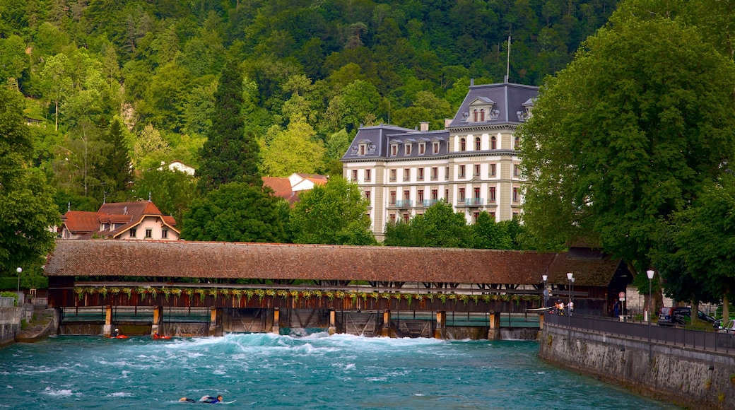 Interlaken som viser bro og elv eller bekk